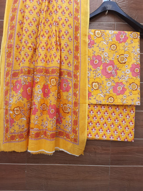 Mango yellow color cotton dress material with mulmul dupatta